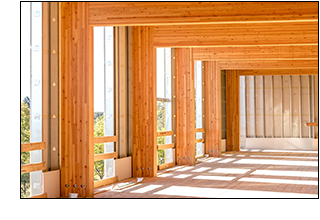 Using glulam post and beam construction with CLT roofs and floors shaved four months off construction time compared to steel